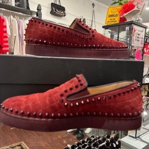 Loubutin spike boat shoe
